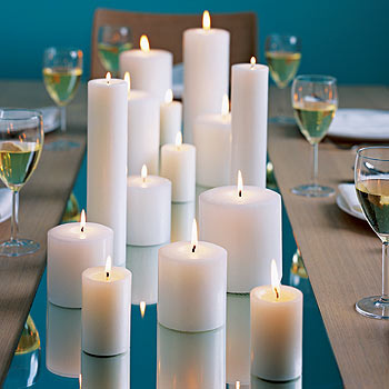 Add a touch of romance to your wedding by placing candles of varying heights